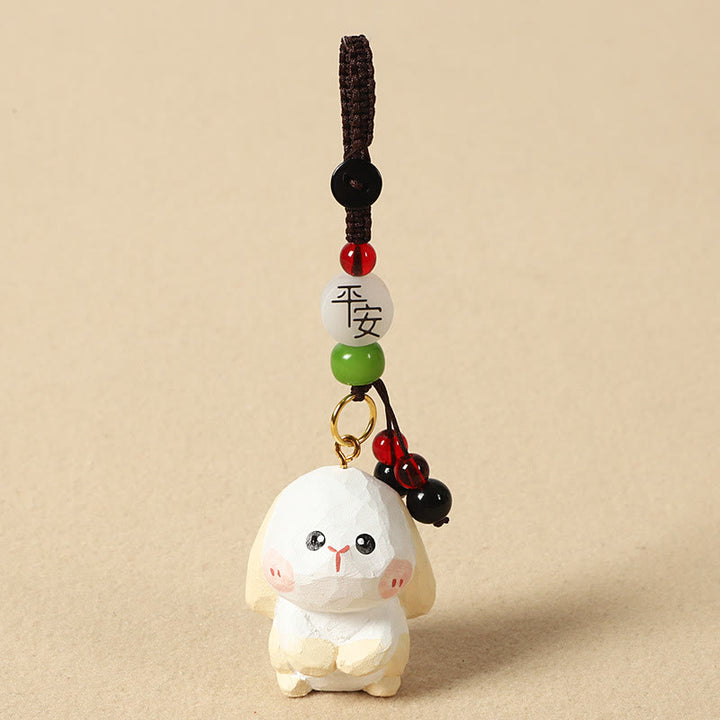 Buddha Stones Llavero chino de madera de tilo con grabado de flor de ciruelo, paz, seguridad, Om Mani Padme Hum positivo - Conejo de 4 cm (el color, la forma y el tamaño pueden variar). - Paz y seguridad - image 18