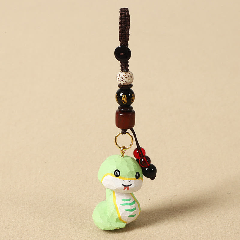 Buddha Stones Llavero chino de madera de tilo con grabado de flor de ciruelo, paz, seguridad, Om Mani Padme Hum positivo - Serpiente de 4 cm (el color, la forma y el tamaño pueden variar). - Om Mani Padme Hum - image 22