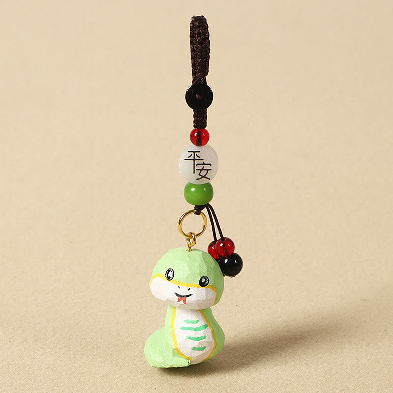 Buddha Stones Llavero chino de madera de tilo con grabado de flor de ciruelo, paz, seguridad, Om Mani Padme Hum positivo - Serpiente de 4 cm (el color, la forma y el tamaño pueden variar). - Paz y seguridad - image 25