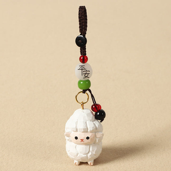Buddha Stones Llavero chino de madera de tilo con grabado de flor de ciruelo, paz, seguridad, Om Mani Padme Hum positivo - Cabra de 4 cm (el color, la forma y el tamaño pueden variar). - Paz y seguridad - image 28