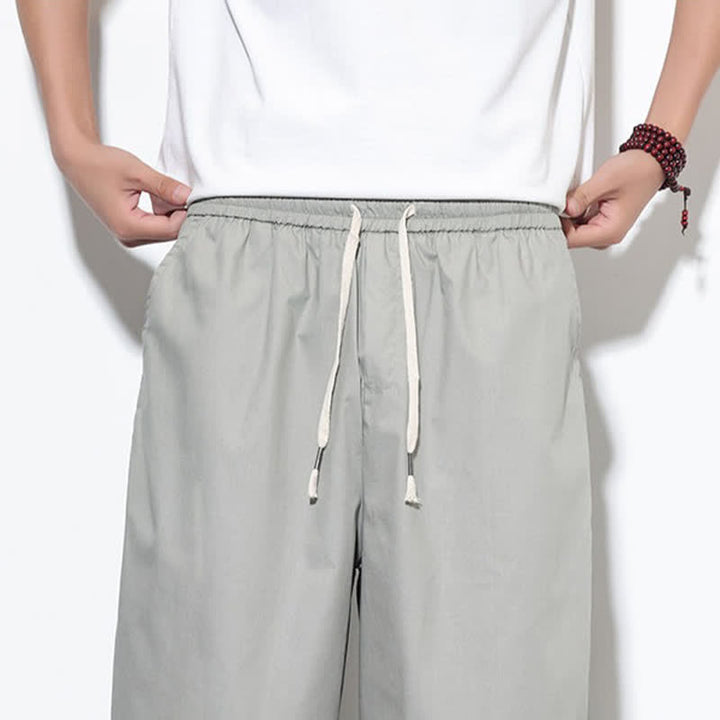 Buddha Stones Pantalones harem de algodón liso para hombre, estilo casual de verano, con cordón ajustable, aberturas laterales y bolsillos. - image 27