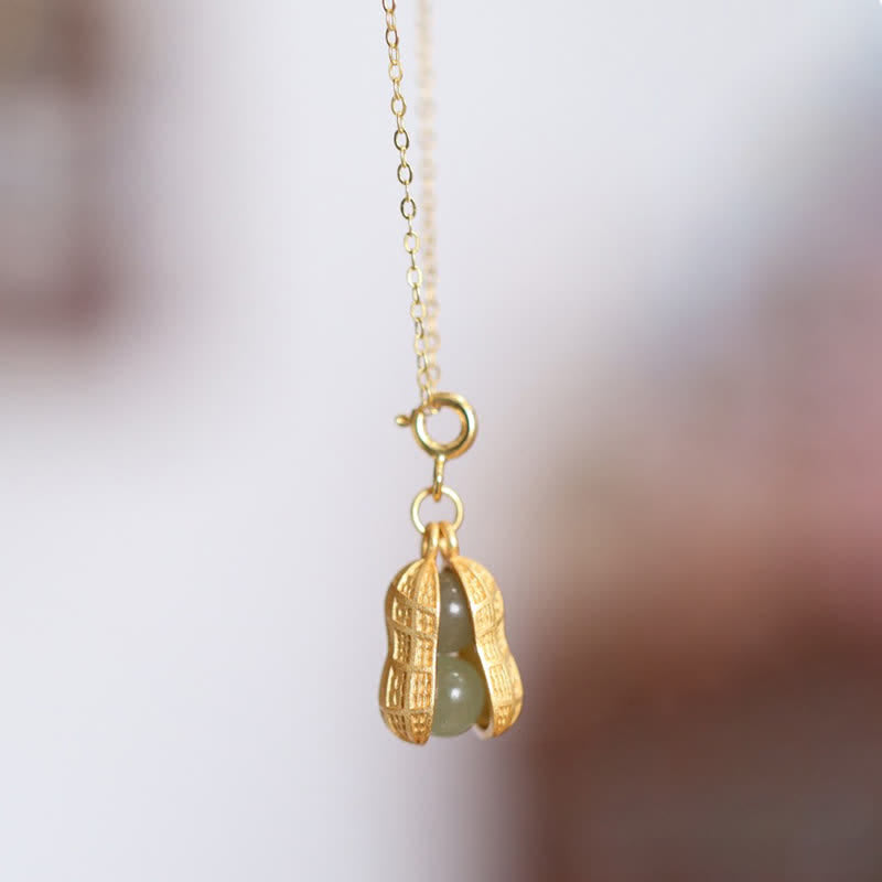 Buddha Stones Colgante de plata de ley 925 con jade Hetian en forma de cacahuete y símbolo de prosperidad. - image 1
