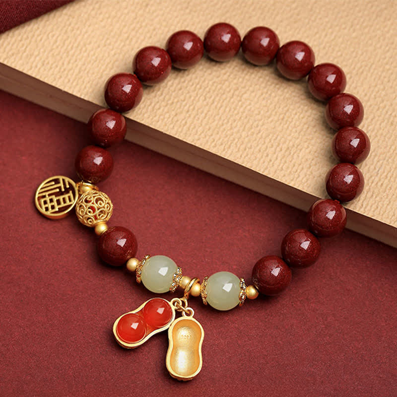 Buddha Stones Pulsera de la bendición del personaje Fu de cinabrio natural con cacahuete y la frase "Las cosas buenas suceden". - Cinabrio (circunferencia de la muñeca: 15-16 cm) - image 0