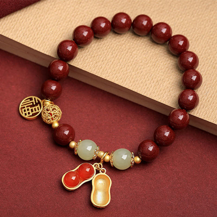 Buddha Stones Pulsera de la bendición del personaje Fu de cinabrio natural con cacahuete y la frase "Las cosas buenas suceden". - Cinabrio (circunferencia de la muñeca: 15-16 cm) - image 0