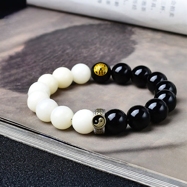 Buddha Stones Obsidiana negra Semilla Bodhi Yin Yang Mantra de nueve caracteres Fantasmas de montaña Gasta dinero Pulsera de fuerza - Semilla de Bodhi de obsidiana negra - 12 mm (circunferencia de la muñeca: 17-18 cm) - image 0