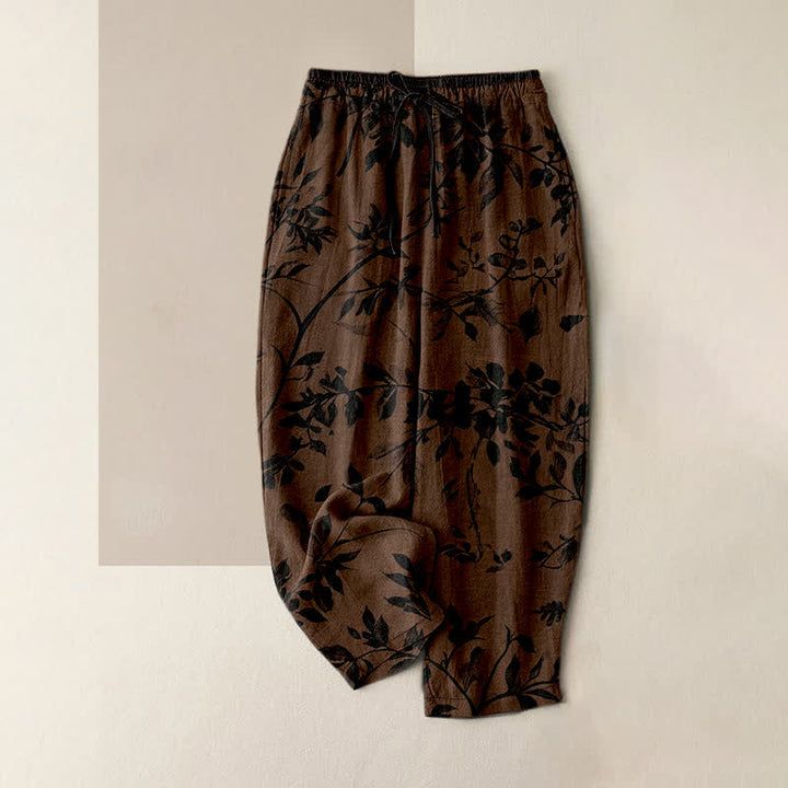 Buddha Stones Pantalones de mujer de algodón puro con estampado botánico de hojas negras, cintura elástica y bolsillos. - Marrón silla de montar - US16，UK/AU20，EU48 (3XL) - image 0