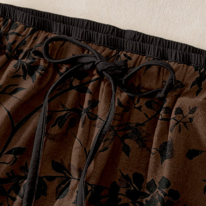 Buddha Stones Pantalones de mujer de algodón puro con estampado botánico de hojas negras, cintura elástica y bolsillos. - image 1