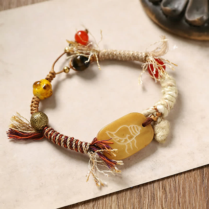 Buddha Stones Pulsera de la paz de cuerda trenzada con el personaje de Bone Fu - Hueso con patrón de concha (circunferencia de la muñeca: 20-22 cm) - image 2