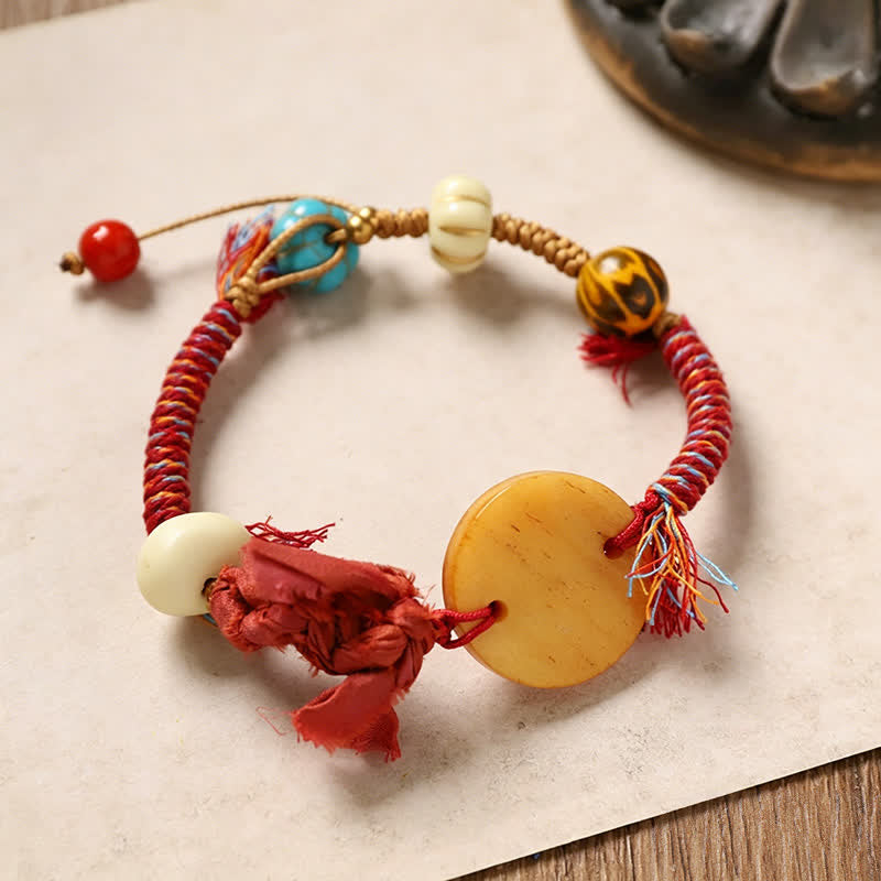 Buddha Stones Pulsera de la paz de cuerda trenzada con el personaje de Bone Fu - Hueso redondo (circunferencia de la muñeca: 20-22 cm) - image 0