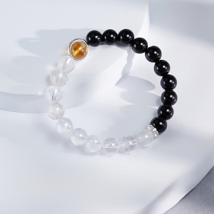 Buddha Stones Pulsera protectora de cuarzo transparente y obsidiana negra - image 1