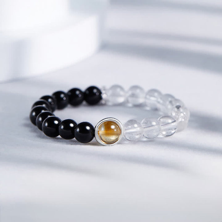 Buddha Stones Pulsera protectora de cuarzo transparente y obsidiana negra - Cuarzo transparente y obsidiana negra (circunferencia de la muñeca: 15-16 cm) - image 0
