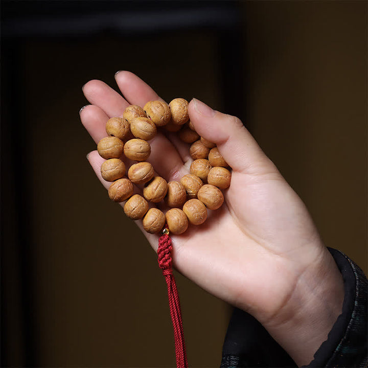 Buddha Stones Mala de muñeca tibetana con borla grabada y diseño del Ojo de Fénix y la Sabiduría Bodhi - image 6