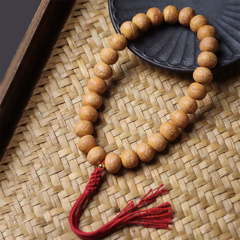 Buddha Stones Mala de muñeca tibetana con borla grabada y diseño del Ojo de Fénix y la Sabiduría Bodhi - Bodhi Ojo de Fénix (Protección♥Sabiduría) - image 0