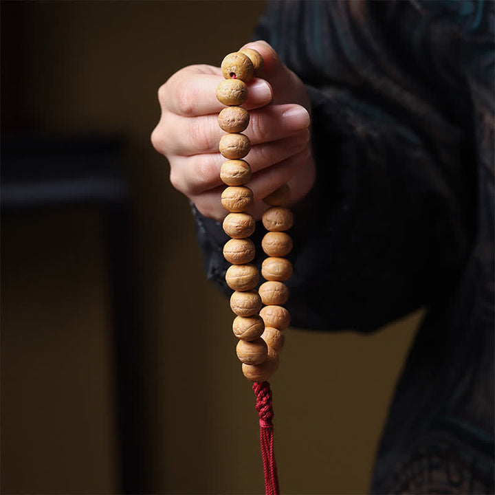 Buddha Stones Mala de muñeca tibetana con borla grabada y diseño del Ojo de Fénix y la Sabiduría Bodhi - image 3
