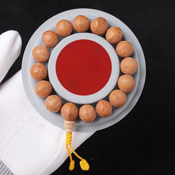 Buddha Stones Mala étnica tallada a mano con el símbolo del ojo de fénix y la sabiduría de Bodhi - Mala de muñeca con forma de barril y ojo de fénix - 14 mm - Bodhi Ojo de Fénix (Protección♥Sabiduría) - image 2