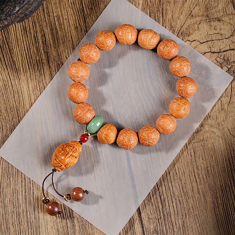 Buddha Stones Mala étnica tallada a mano con el símbolo del ojo de fénix y la sabiduría de Bodhi - Pulsera Ojo de Fénix Mala - 15 mm - Bodhi Ojo de Fénix (Protección♥Sabiduría) - image 0