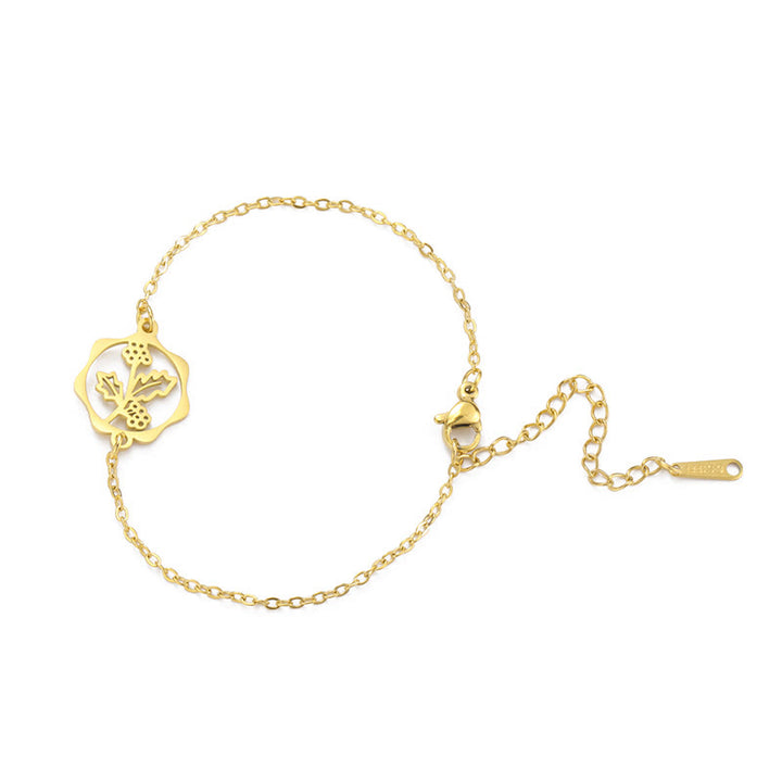 Buddha Stones Pulsera de acero de titanio con flor de nacimiento, nuevo comienzo - Acebo - Acero de titanio dorado - image 35