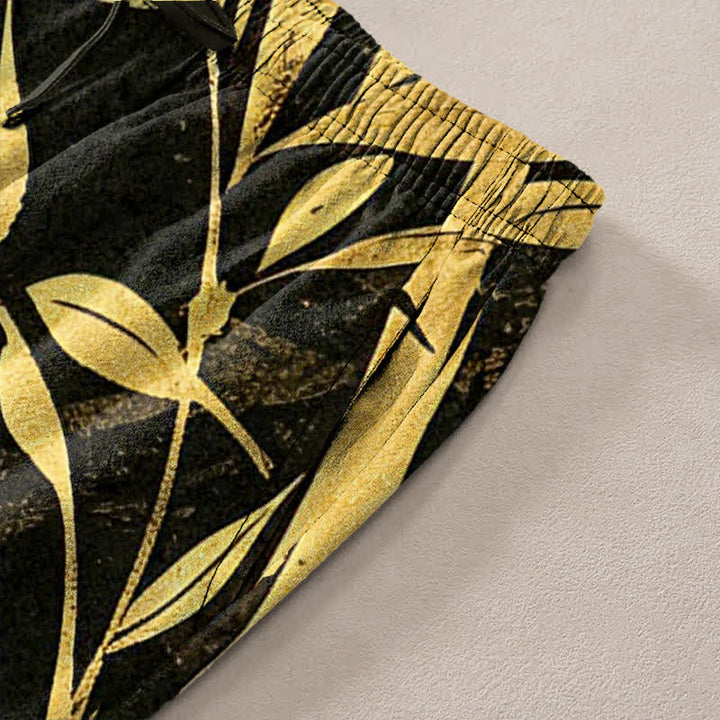 Buddha Stones Pantalones de hombre de algodón con estampado de hojas de bambú doradas, corte ajustado y bolsillos. - image 3