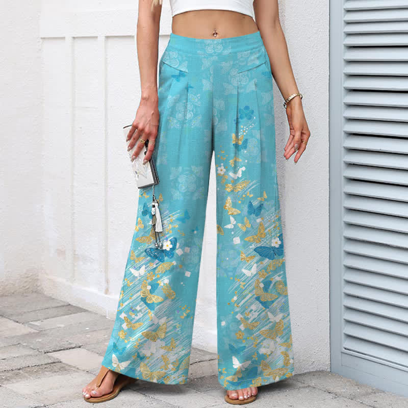 Buddha Stones Pantalones de mujer de algodón y lino con estampado floral bohemio de mariposas doradas, cintura elástica y pernera ancha con bolsillos. - image 1