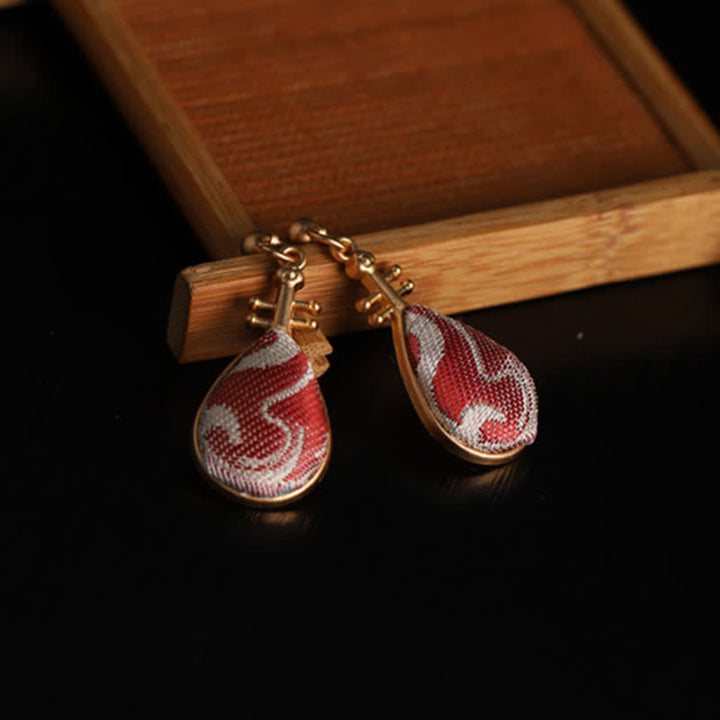 Buddha Stones Pendientes de lágrima Harmony con diseño de brocado blanco y estampados Song. - image 1