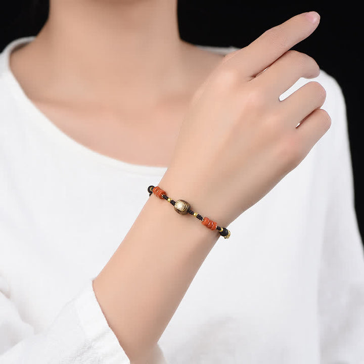 Buddha Stones Pulsera trenzada con borla de sándalo rojo tejida a mano con símbolo de bendición - image 10