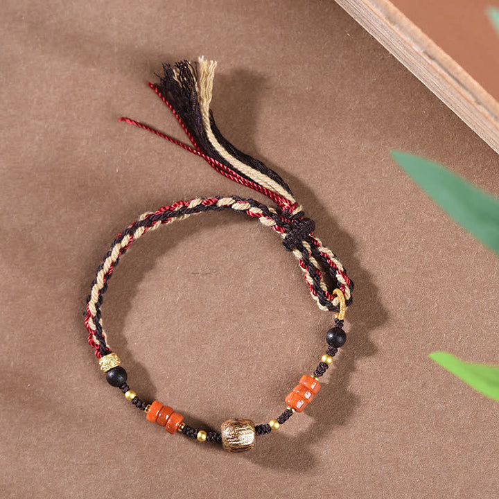 Buddha Stones Pulsera trenzada con borla de sándalo rojo tejida a mano con símbolo de bendición - image 4