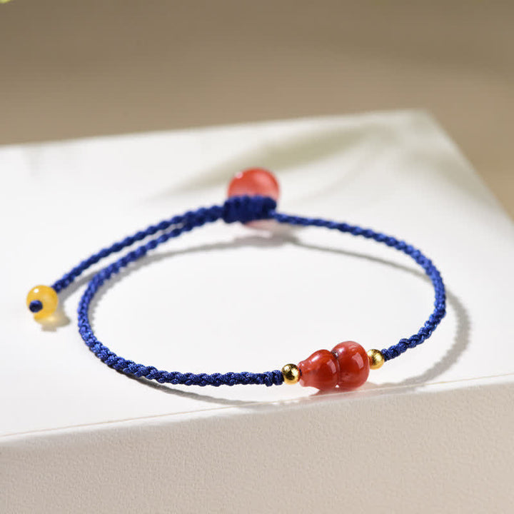Buddha Stones Pulsera de hilo azul tejida a mano con ágata roja del sur y diseño de calabaza. - image 4