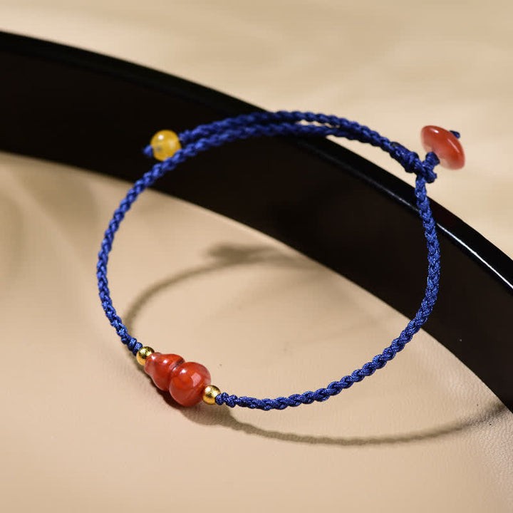 Buddha Stones Pulsera de hilo azul tejida a mano con ágata roja del sur y diseño de calabaza. - Ágata Roja del Sur (Confianza♥Pasión) - image 0