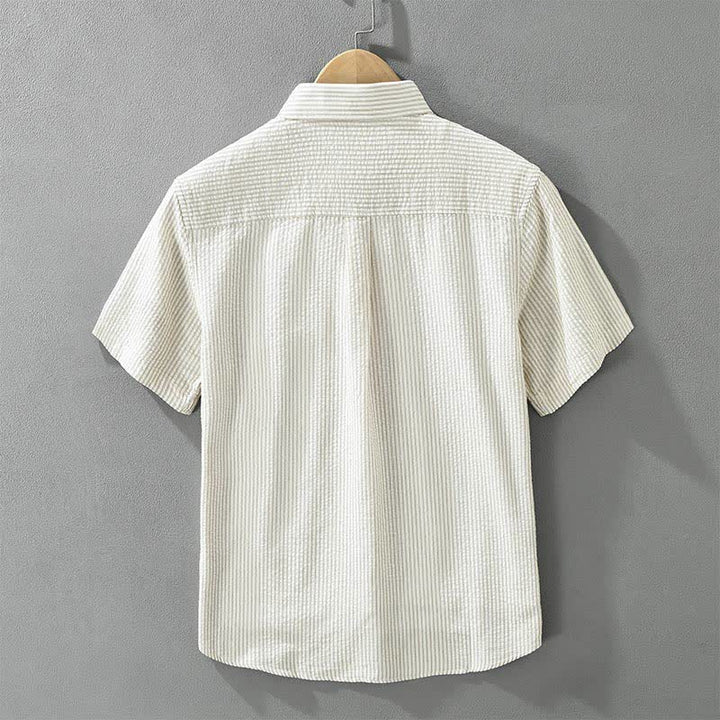 Buddha Stones Camisa de manga corta de algodón a rayas para hombre, estilo casual de verano, con botones y bolsillo decorativo. - image 2
