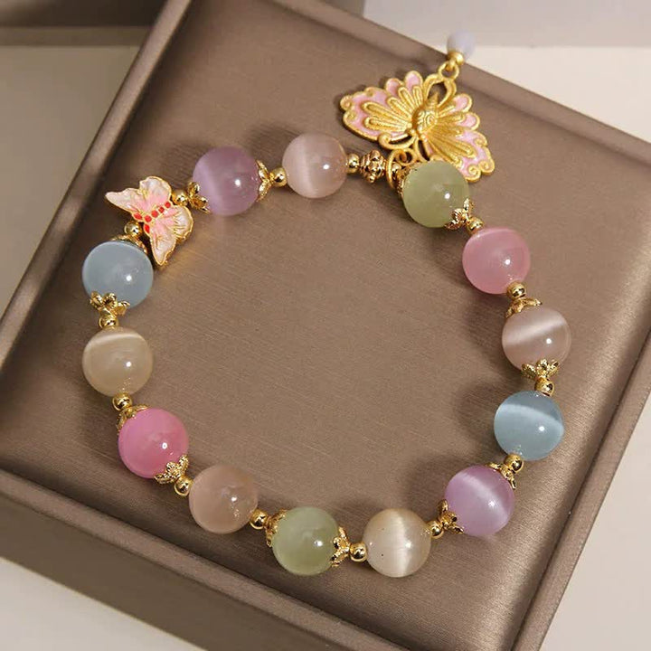 Buddha Stones Pulsera multicolor con cuentas de mariposa ojo de gato y amor - image 8
