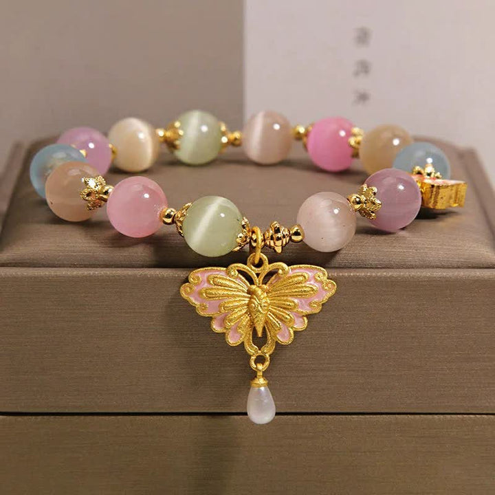 Buddha Stones Pulsera multicolor con cuentas de mariposa ojo de gato y amor - Piedra Ojo de Gato (Amor♥Apoyo) - image 0