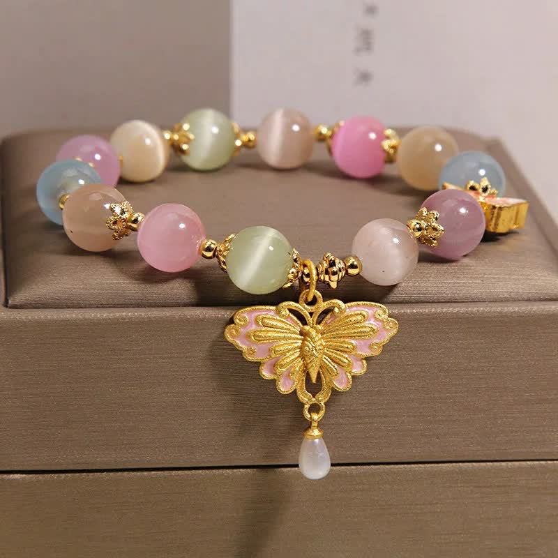 Buddha Stones Pulsera multicolor con cuentas de mariposa ojo de gato y amor - image 1