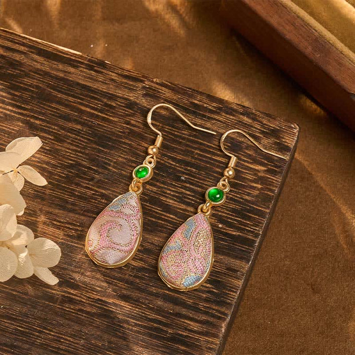 Buddha Stones Pendientes de seda artesanales con coloridos diseños y forma de lágrima. - image 1