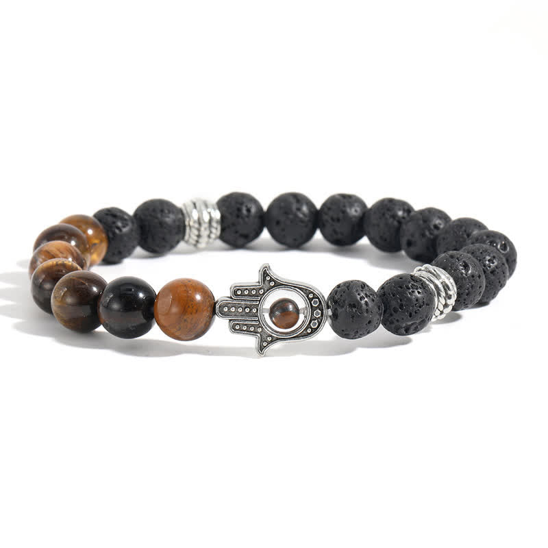 Buddha Stones Pulsera redonda artesanal de protección con diseño de palma de Hamsa y roca de lava - Ojo de tigre y roca volcánica - image 11