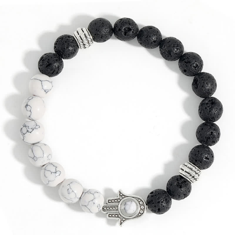 Buddha Stones Pulsera redonda artesanal de protección con diseño de palma de Hamsa y roca de lava - image 14