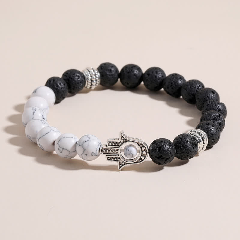Buddha Stones Pulsera redonda artesanal de protección con diseño de palma de Hamsa y roca de lava - image 0