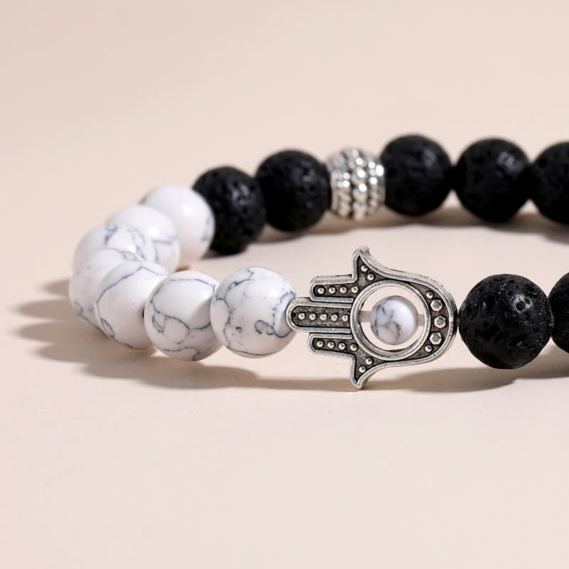 Buddha Stones Pulsera redonda artesanal de protección con diseño de palma de Hamsa y roca de lava - image 16