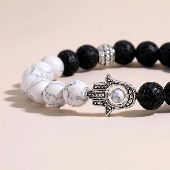 Buddha Stones Pulsera redonda artesanal de protección con diseño de palma de Hamsa y roca de lava - image 16