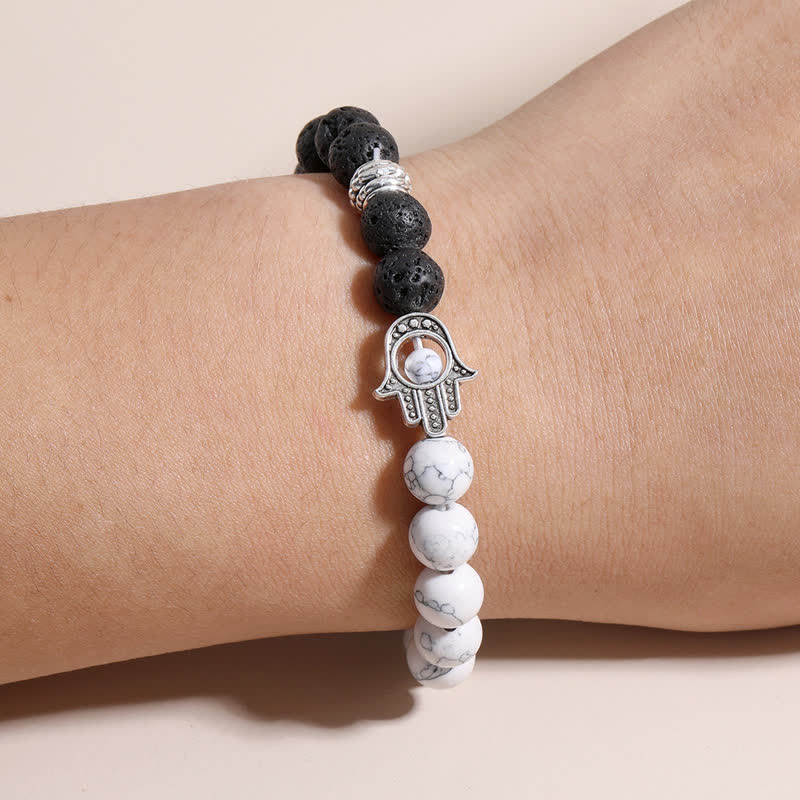 Buddha Stones Pulsera redonda artesanal de protección con diseño de palma de Hamsa y roca de lava - image 17