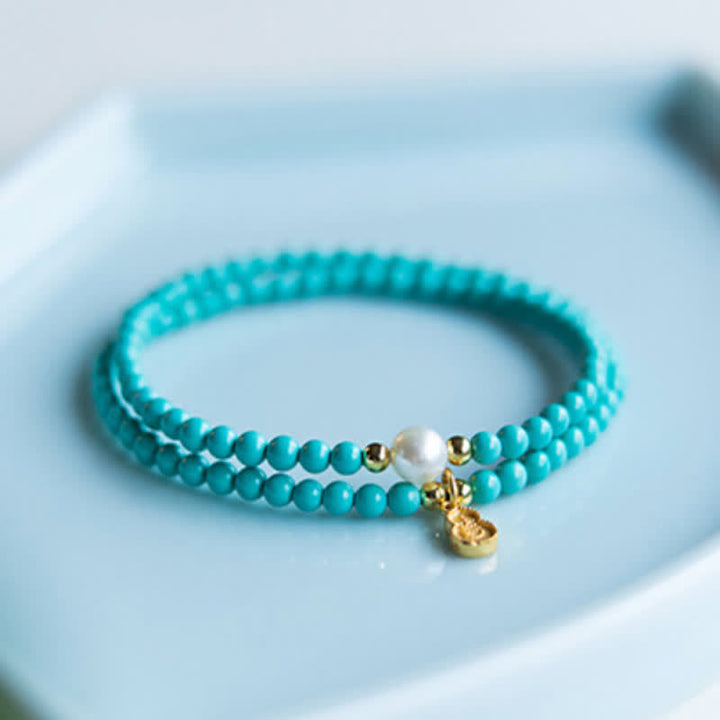 Buddha Stones Pulsera artesanal con colgante de calabaza, perlas turquesas y doble envoltura para mayor protección. - image 2