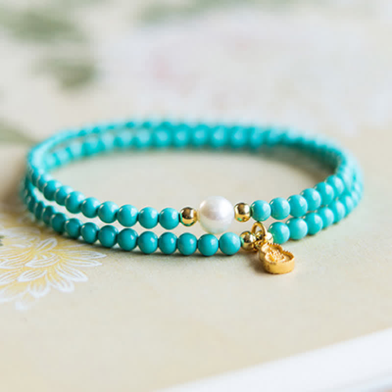 Buddha Stones Pulsera artesanal con colgante de calabaza, perlas turquesas y doble envoltura para mayor protección. - image 1