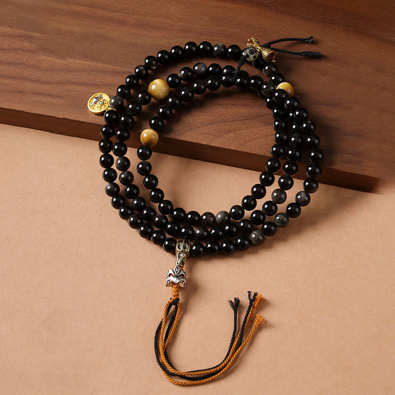 Buddha Stones Collar de cuentas tejido a mano con diseño de Garuda y brillo plateado de obsidiana. - image 0