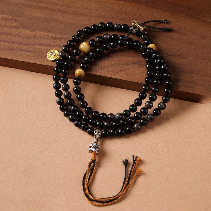 Buddha Stones Collar de cuentas tejido a mano con diseño de Garuda y brillo plateado de obsidiana. - image 0