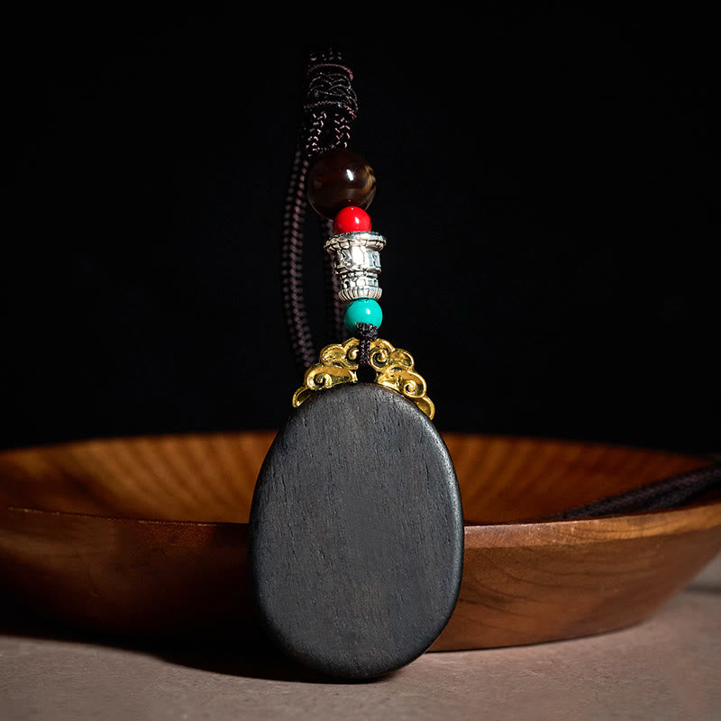 Buddha Stones Collar ovalado tribal hecho a mano en madera de ébano con diseño de sabiduría. - image 2