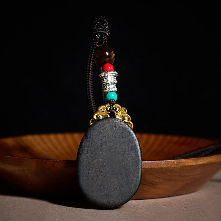 Buddha Stones Collar ovalado tribal hecho a mano en madera de ébano con diseño de sabiduría. - image 2