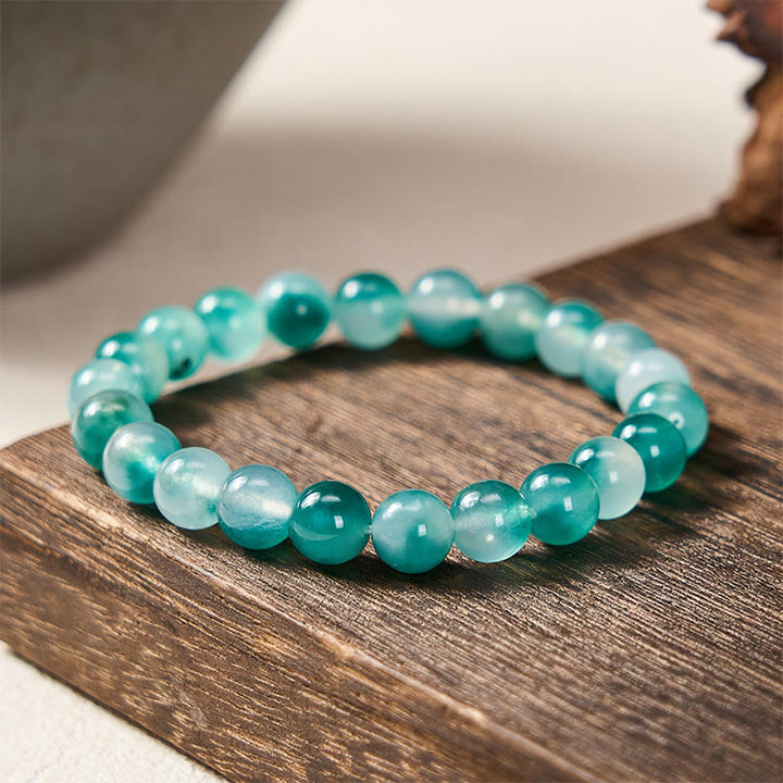 Buddha Stones Pulsera de cuentas redondas con estampado floral azul y equilibrio emocional de calcedonia blanca - 8 mm - Calcedonia blanca (Armonía♥Positiva) - image 0