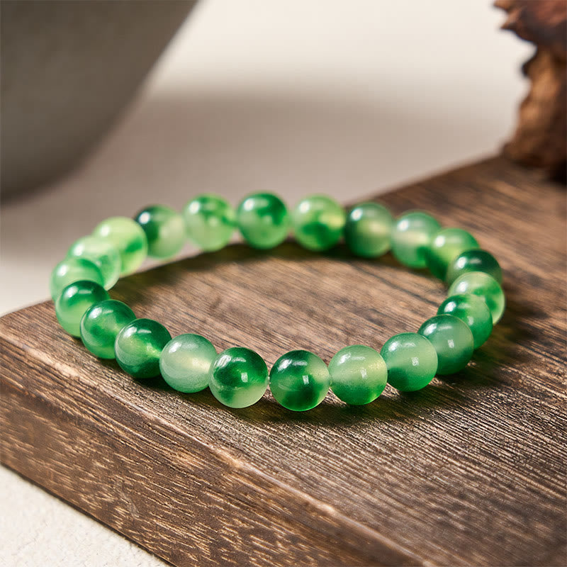 Buddha Stones Pulsera redonda de cuentas con flor flotante verde y calcedonia blanca - 8 mm - Calcedonia blanca (Armonía♥Positiva) - image 0