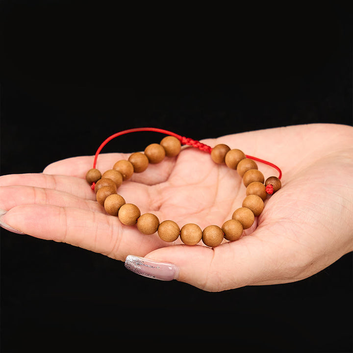 Buddha Stones Mala de muñeca de cuentas de sándalo tibetano para enraizar - image 8