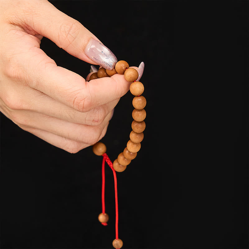 Buddha Stones Mala de muñeca de cuentas de sándalo tibetano para enraizar - image 6