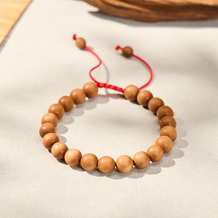 Buddha Stones Mala de muñeca de cuentas de sándalo tibetano para enraizar - image 2